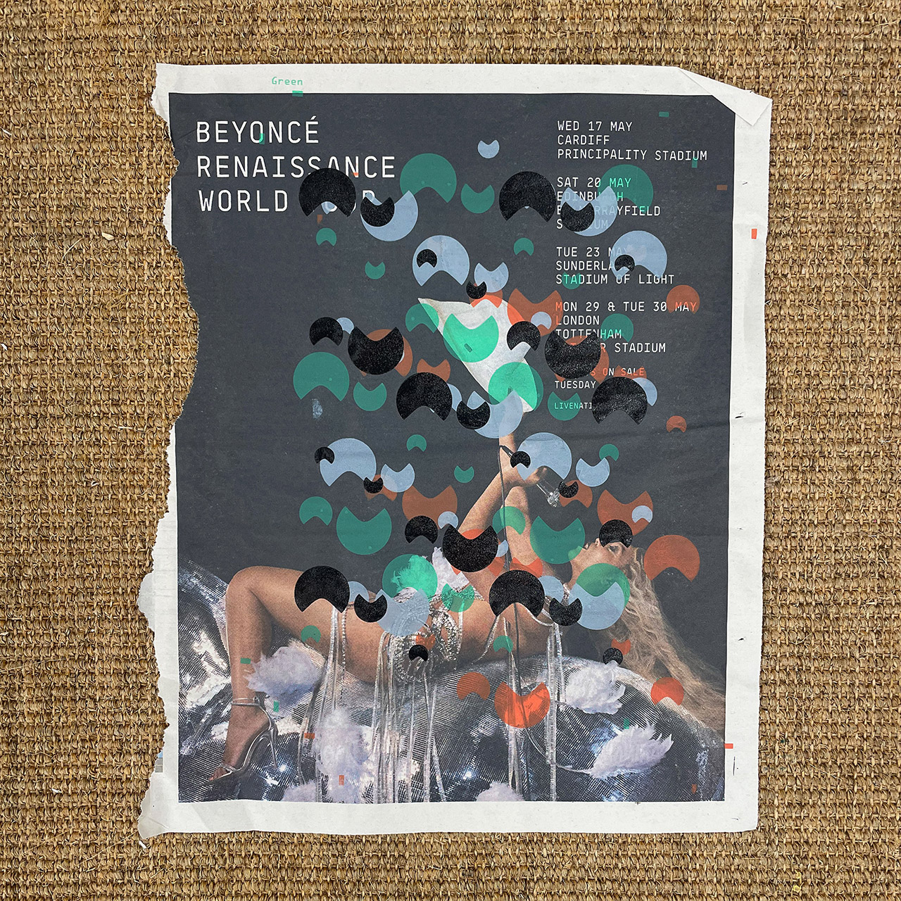 Scrap paper with print over top of advert for Beyonc&eacute; show